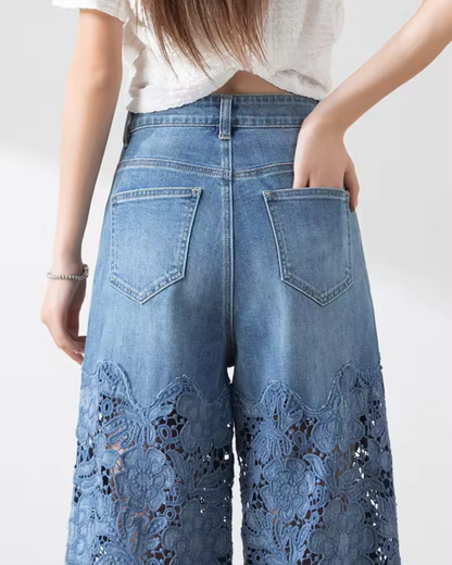 Calças de ganga de cintura média para mulher com botões e remendos de renda