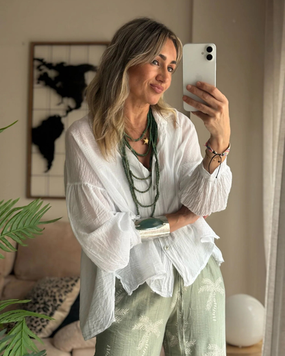 Camisa de linho com botões e mangas ajustáveis com estilo oversize para mulher