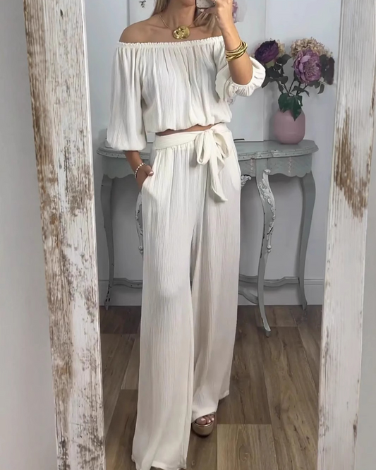 Conjunto de blusa com ombros descobertos e calças Palazzo