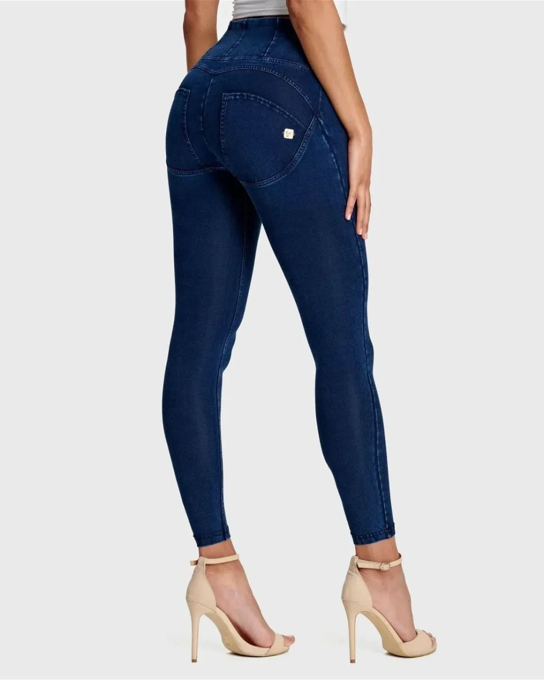 Calças com ajuste modelador para mulher