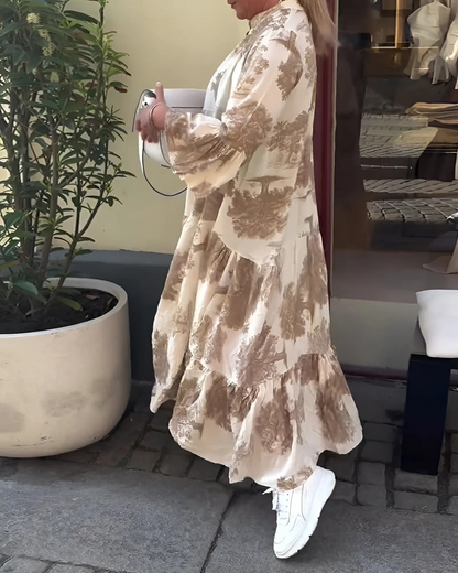 Vestido com estampado botânico e corte que realça a sua silhueta