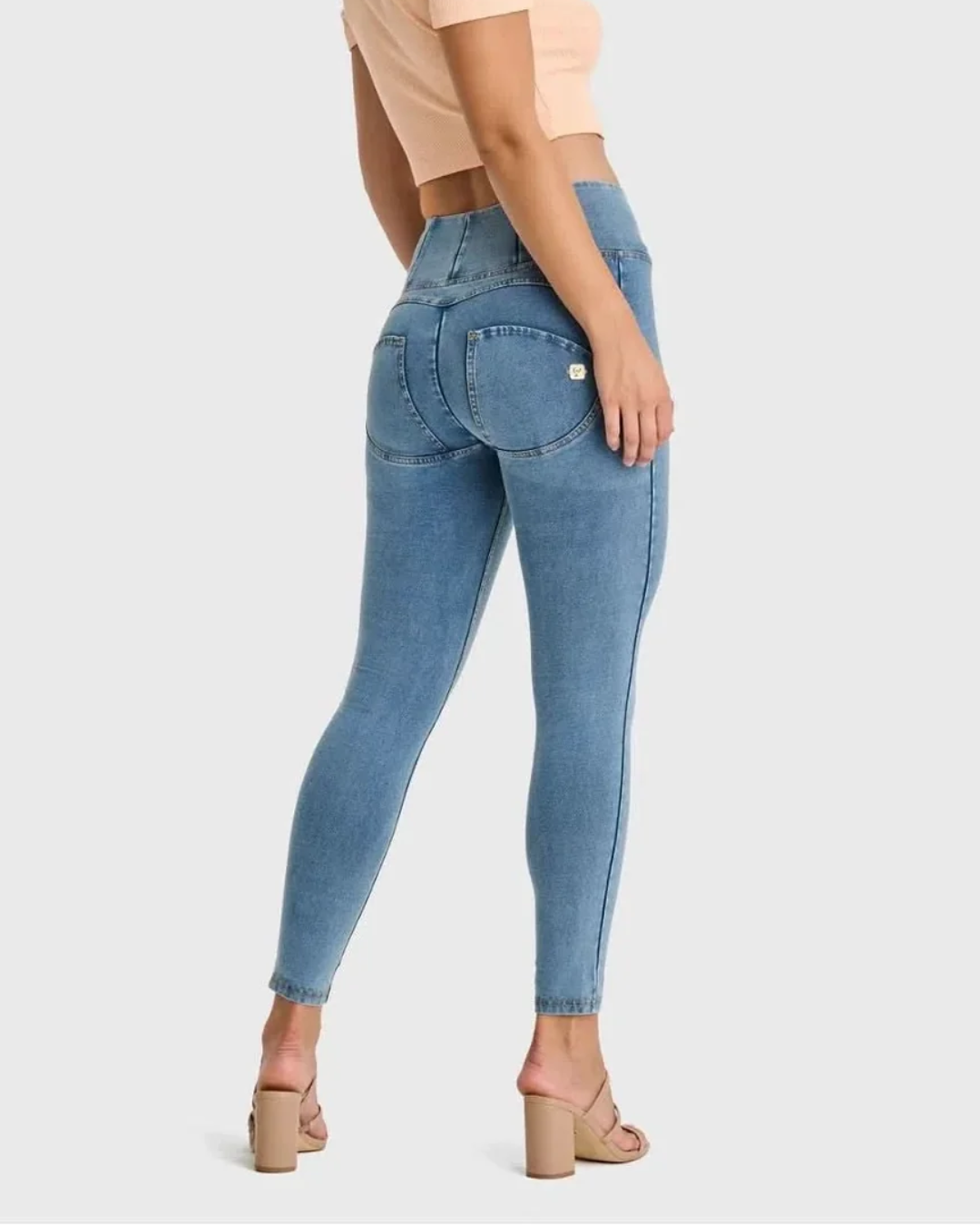 Calças com ajuste modelador para mulher