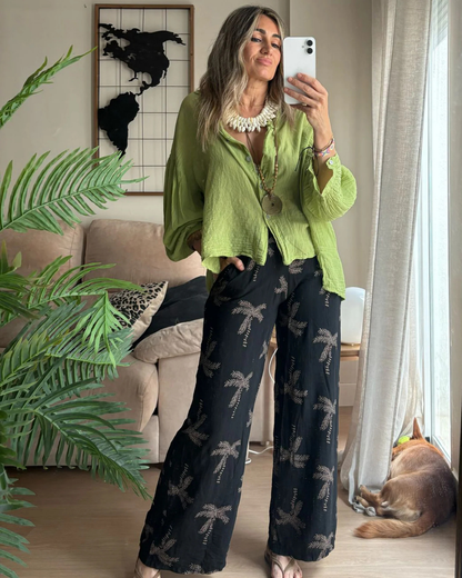 Camisa de linho com botões e mangas ajustáveis com estilo oversize para mulher