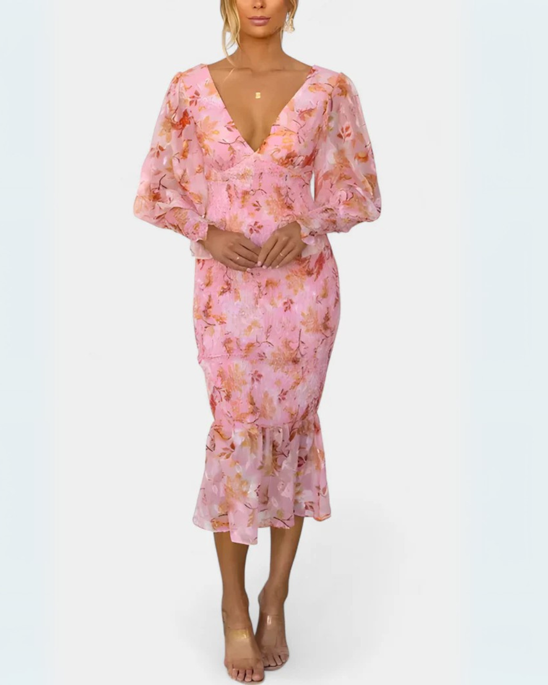 Vestido floral com cintura franzida e mangas compridas