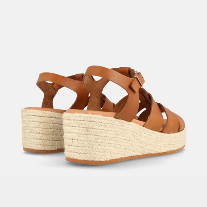 sandálias de mulher com plataforma de esparto e tiras cruzadas