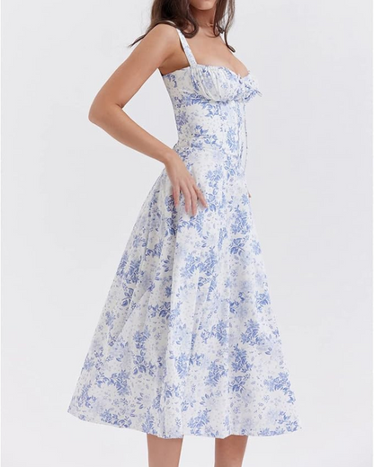 Vestido comprido com silhueta romântica e decote delicado