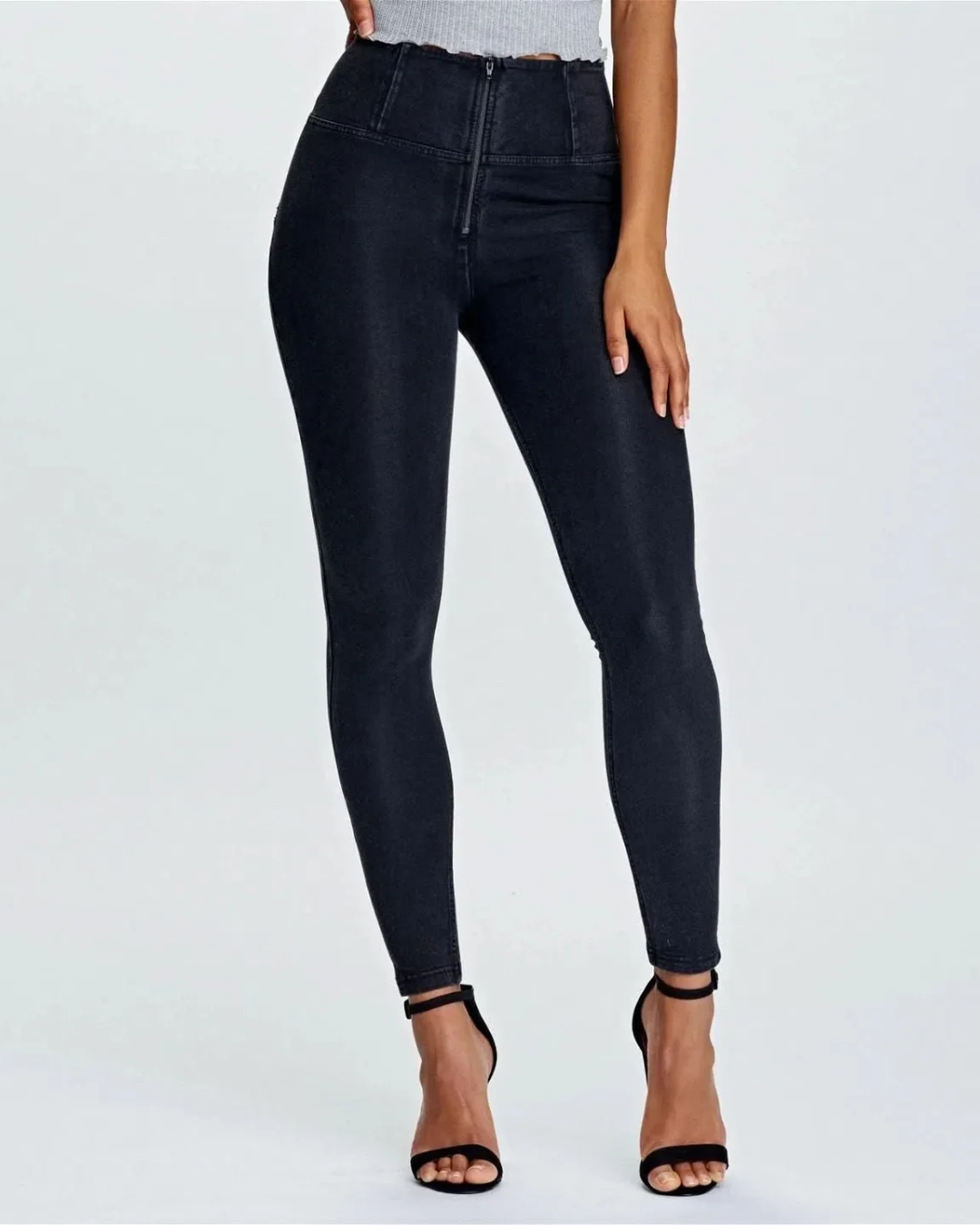 Calças com ajuste modelador para mulher