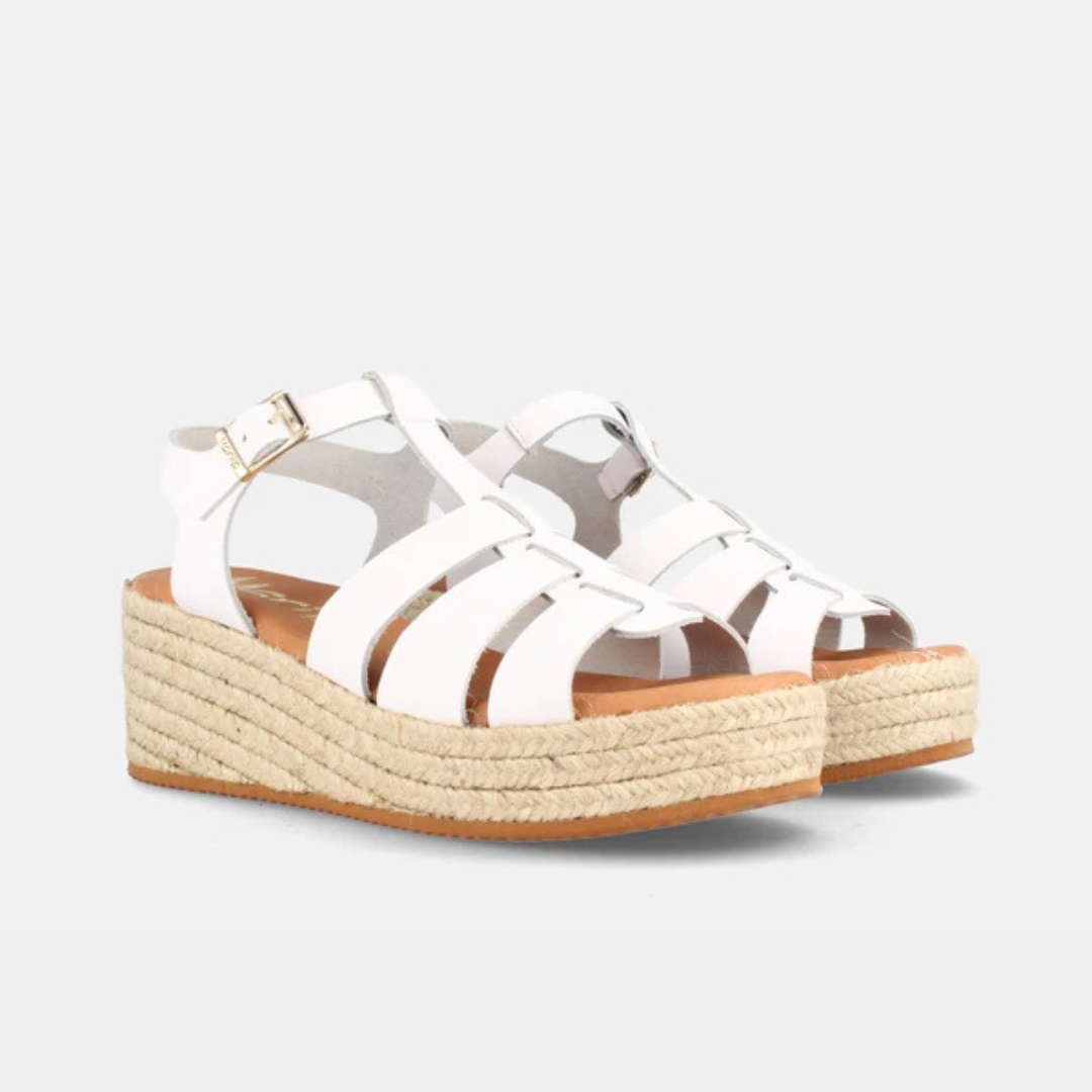 sandálias de mulher com plataforma de esparto e tiras cruzadas